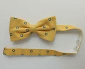 Yellow bow tie with blue squares pattern fits collar sizes up to 18.5"  DG